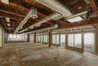 © Mint Images - Empty office space under construction