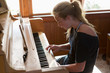© Marc Romanelli - 13 year old girl playing piano