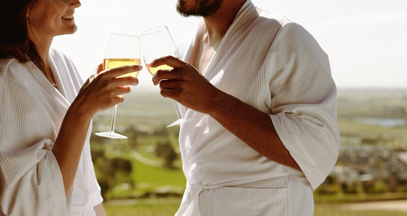 Poster - Couple toasting wine at home