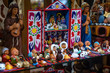 Colorful Peruvian artisanal Retablo for sale at street Indian market in Miraflores, Lima. A traditional devotional handcraft with iconography derived from traditional Catholic church art.