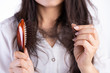 © Siam - Healthy concept. Woman show her brush with damaged long loss hair and looking at her hair.