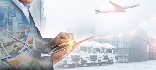 Business, shipping industry and transportation background by business man is using technology tablet to command logistics method.