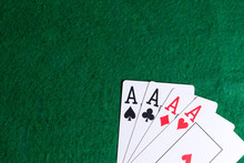 Set Of Four Aces On The Green Table
