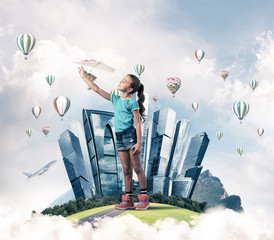 Wall Mural - Concept of careless happy childhood with girl dreaming about future