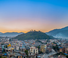 Cityscape Over The Swayambhunath Temple In Kathmandu At Sunset