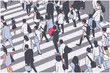 Illustration of busy city crowd crossing zebra