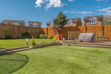 Modern Garden Designed And Landscaped With Newly Constructed Materials And Taken In Afternoon Light.