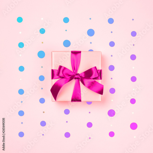 Pink gift box with pink bow.