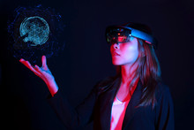 Business Woman Try Vr Glasses Hololens In The Dark Room. Young Asian Girl Experience Ar With Glow Earth Globe On Hand. Future Technology Concept