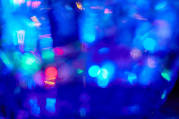 Yak background of multicolored spots of light in defocus