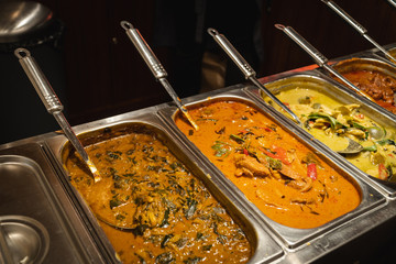 Thai curry in soup station at buffet restaurant