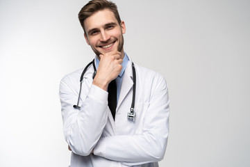 Smiling medical worker in white coat isolated on white.