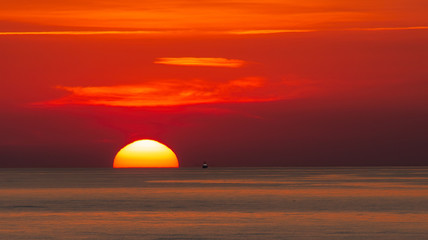 Wall Mural - A beautiful sunrise off the coast of St Simons Island in Georgia