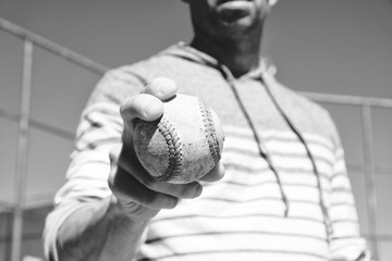 Canvas Print - Baseball player with ball to play with in black and white.