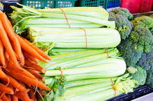 Bunches Of Fresh Celery, Carrot And Broccoli At A Market
