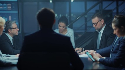 Poster - In the Corporate Meeting Room: Diverse Group of Business Associates and ExecutivesTalking, Negotiating, Debating, Working with Documents, Planning Strategy. Late at Night in the Office. High Angle