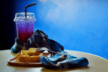 Butter Toasted Bread On Wood Trey And Ice Sour Purple Butterfly Pea Juice Blue Table Wood Table Set With Blue Tone Background