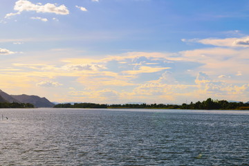 The sky with clouds and rivers on a day with beautiful sunshine and nature.