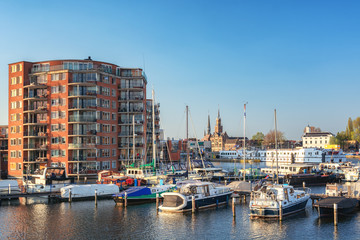 Wall Mural - Impression of Zaandam located along the river Zaan seen from the marina