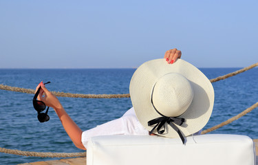 Woman on the sea beach