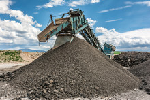 Recycling Plant. Transforming Asphalt From A Gravel Road To The Construction Of A New Highway