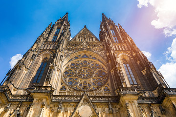 Wall Mural - Prague, bell gothic towers and St. Vitus Cathedral. St. Vitus is a Roman Catholic cathedral in Prague, Czech Republic. Panoramic view from the courtyard to the south facade. Prague, Czechia.