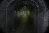 Fototapeta Perspektywa 3d - Underground passages of the Vladivostok fortress. Underground tunnel of Russian forts in Vladivostok