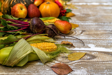 Wall Mural - Assortment of fresh fruits and vegetables. Fresh organic fruits and vegetables for layout on white wooden background. Healthy food clean eating selection. Copy space.