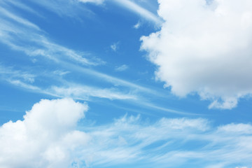 White fluffy clouds in the blue sky