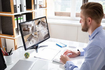 Aufkleber - Man Monitoring CCTV Footage