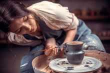 Stylish Pottery Woman Enjoying Pottery Art And Production Process. The Concept Of Craft Creativity.