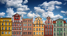 Colorful Facades Of Historic Buildings Against The Sky In The Historic Old Town Of Wroclaw, Poland. Architecture And Historic Background.