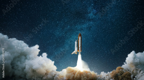 Spaceship takes off into the starry sky Canvas Print