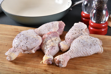 Wall Mural - Seasoned raw chicken drumsticks