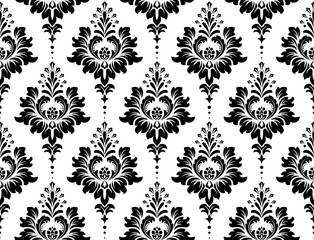 Wallpaper in the style of Baroque. Seamless vector background. White and black floral ornament. Graphic pattern for fabric, wallpaper, packaging. Ornate Damask flower ornament