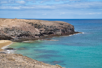 Wall Mural - Papagayo beach, one the most well known of all beaches around Playa Blanca in Lanzarote, Spain