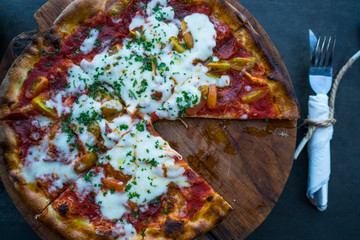 Wall Mural - Delicious fresh Italian pizza just from the oven. Pizza with tomatoes, basil, champignon mushrooms and cheese.