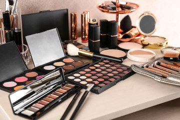 Set of luxury cosmetics on dressing table