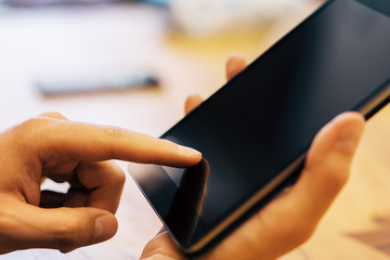 Poster - Sideview of man using tablet