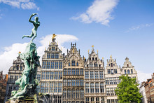 Brabo Monument At The Grote Markt Square In Antwerp, Belgium. Beautiful Old Town Of Antwerpen. Popular Travel Destination And Tourist Attraction