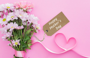 Mothers Day celebration message. Happy mother's day writes on daisy bouquet label