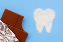 Stomatology Concept. Teeth And Sweets. Sugar Destroys Tooth Enamel And Leads To Tooth Decay, Caries