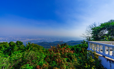 Top view on building of the city to blue sky at Chiang mai, Thailand.