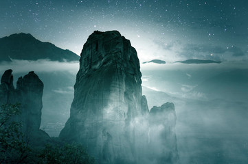 Wall Mural - kalabaka, mountains in greece, night view of rock with stars on sky