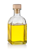Bottle Of Yellow Oil With Wooden Cork