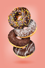 Group Of Chocolate Flying Donuts