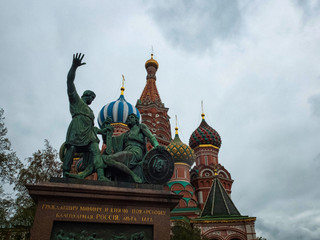 Moscow, Russia - May 2, 2019. Minin and Pozharskiy monument and St.Basil's Cathedral