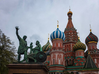 Moscow, Russia - May 2, 2019. Minin and Pozharskiy monument and St.Basil's Cathedral