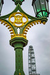 The electric pole at westminster bridge and london eye, the upper part and wheel