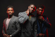 © alfa27 - Positive african ethnicity businessmen, well-dressed business partners wearing stylish suits looking at camera isolated in studio. Business Apparel, Fashion and Style, Men's Formal Clothing